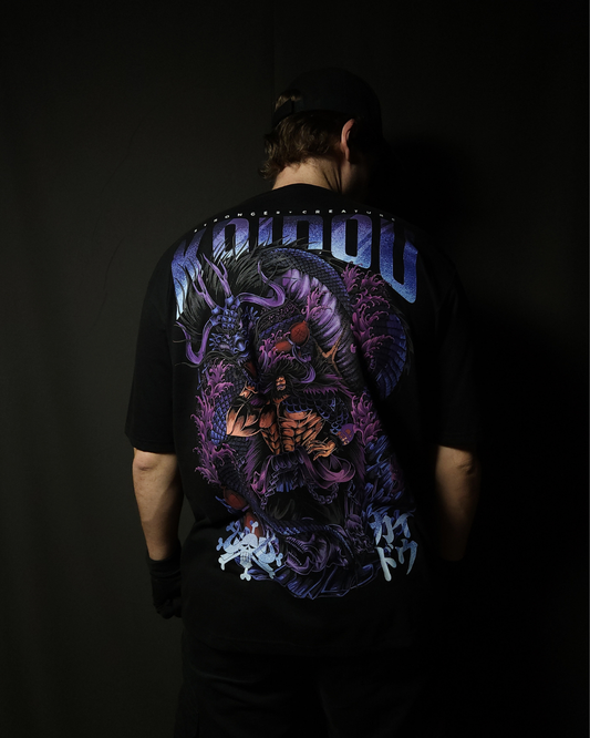 Anime-inspired apparel featuring bold back artwork, worn by a model in a dark studio setting – from a South African anime clothing brand.