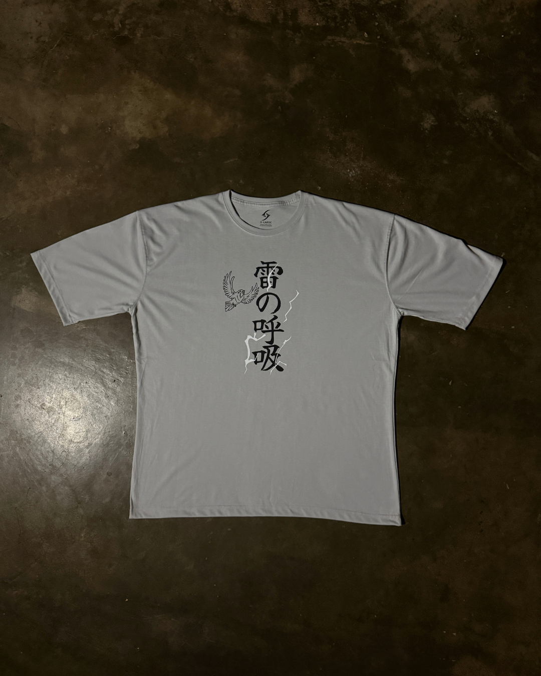 Anime-inspired apparel featuring bold back artwork, worn by a model in a dark studio setting – from a South African anime clothing brand.