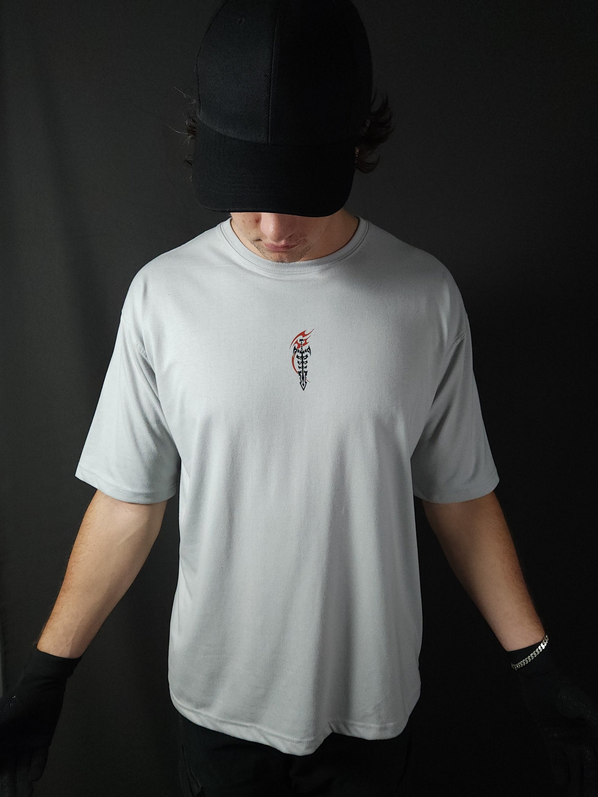 Anime-inspired apparel featuring bold back artwork, worn by a model in a dark studio setting – from a South African anime clothing brand.