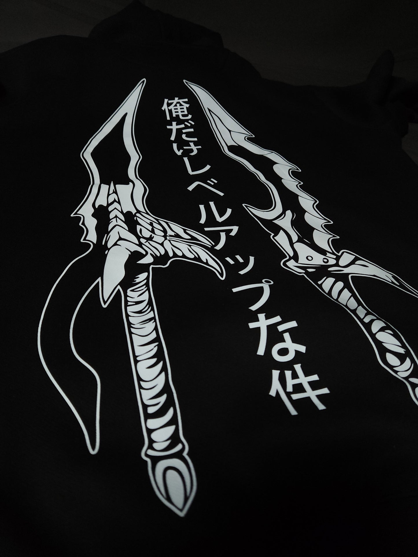 Anime-inspired apparel featuring bold back artwork, worn by a model in a dark studio setting – from a South African anime clothing brand.