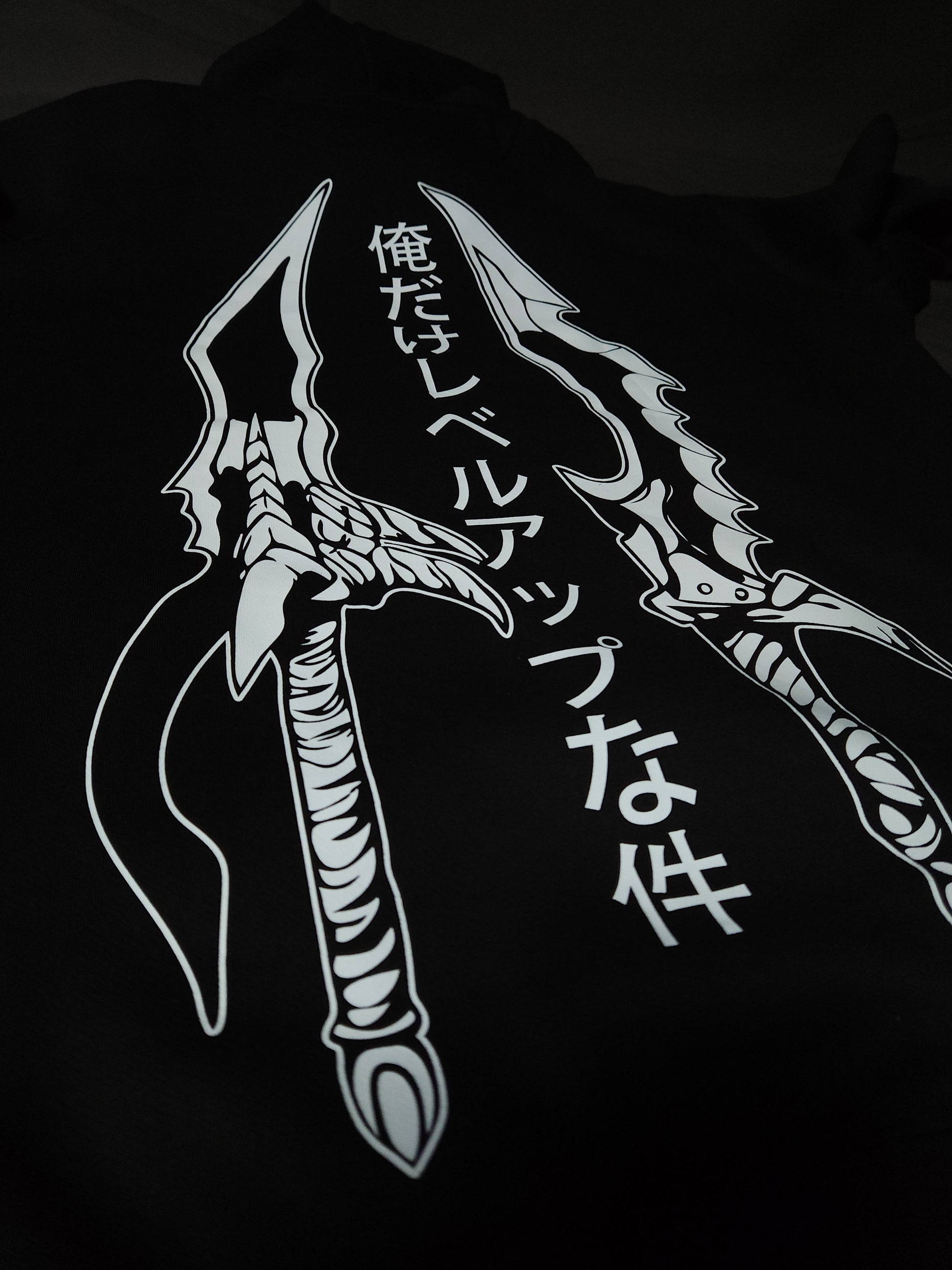 Anime-inspired apparel featuring bold back artwork, worn by a model in a dark studio setting – from a South African anime clothing brand.