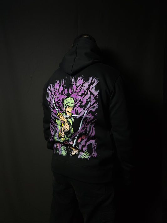 Anime-inspired apparel featuring bold back artwork, worn by a model in a dark studio setting – from a South African anime clothing brand.
