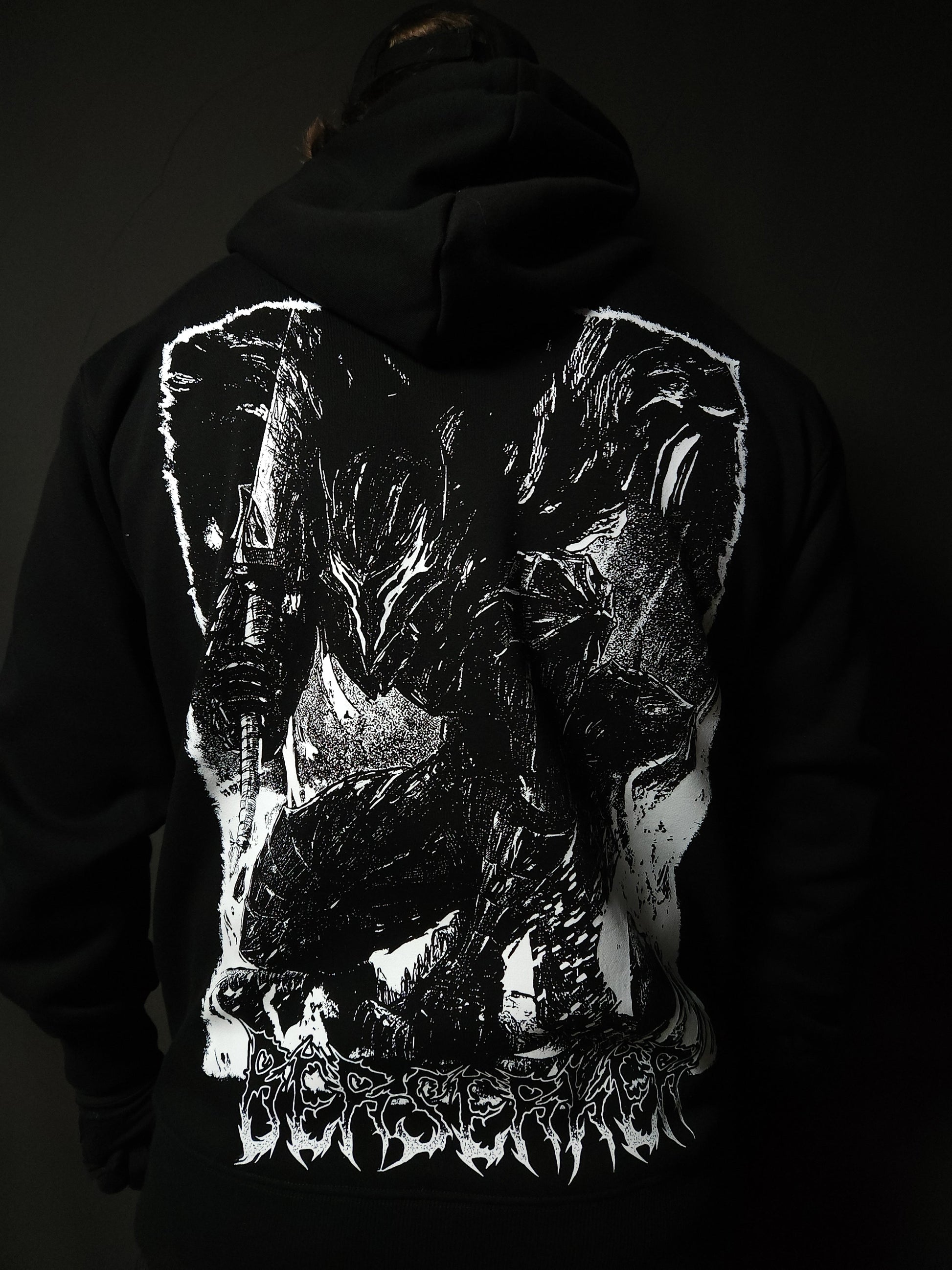 Anime-inspired apparel featuring bold back artwork, worn by a model in a dark studio setting – from a South African anime clothing brand.