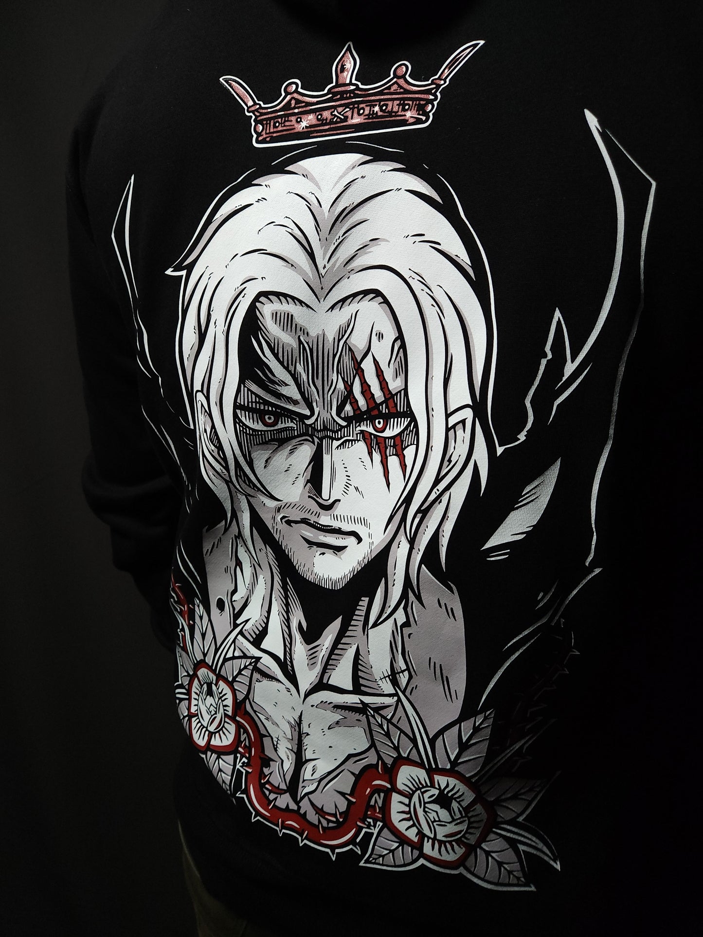 Anime-inspired apparel featuring bold back artwork, worn by a model in a dark studio setting – from a South African anime clothing brand.